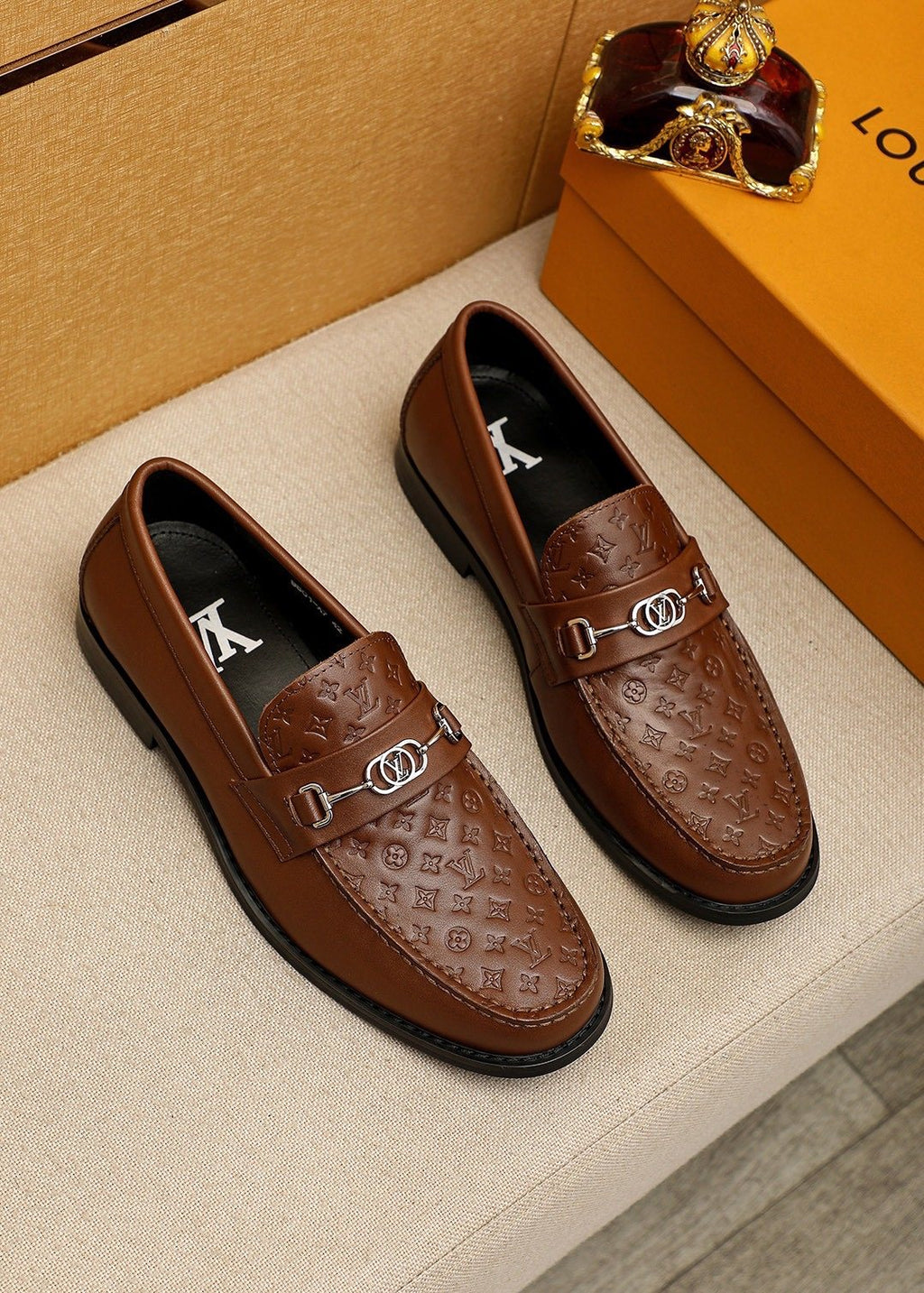 Louis Vuitton Embossed Buckle Loafers - Low-Profile Sole